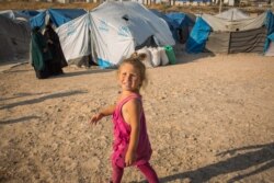 Thousands of children from at least 50 countries are now growing up in locked camps in Syria, after their parents decided to join IS, on Sept. 1, 2019 in Ain Issa Camp, Syria. (VOA/Yan Boechat).