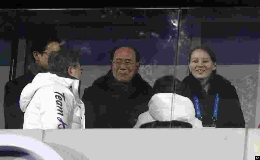 Kim Yong Nam, the 90-year-old president of the Presidium of the North's Parliament, center, and Kim Jong Un's sister Kim Yo Jong greet South Korean President Moon Jae-in and first lady Kim Jung-sook when the combined team came in during the opening ceremo