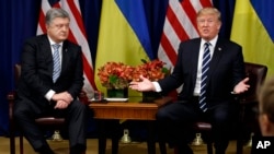President Donald Trump, right, meets with Ukraine's President Petro Poroshenko at the Palace Hotel during the United Nations General Assembly, Sept. 21, 2017, in New York. 
