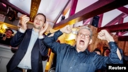 Leader of Demokraatit, Jens-Frederik Nielsen, reacts during the election party at cafe Killut in Nuuk, Greenland, March 12, 2025. (Ritzau Scanpix/Mads Claus Rasmussen via Reuters)