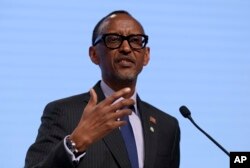 FILE - Rwanda's President Paul Kagame addresses the media during a press conference.