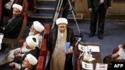 FILE - Iran's judiciary chief, Ayatollah Sadegh Larijani (C), is seen attending a session of the Assembly of Experts in the capital Tehran, March 13, 2018. 