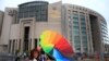 People walk outside Istanbul's court, July 17, 2017. 