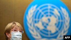 La Haut-Commissaire des Nations Unies aux droits de l'homme, Michelle Bachelet, prononce un discours sur l'évolution des droits de l'homme dans le monde lors d'une session du Conseil des droits de l'homme le 21 juin 2021 à Genève. (Photo AFP/Fabrice COFFRINI)