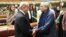 This handout photograph taken and released on March 3, 2024 by the Pakistan National Assembly, shows Pakistan's former President Asif Ali Zardari (R) greeting newly-elected Pakistan's Prime Minister Shehbaz Sharif (L) at the Parliament House in Islamabad.