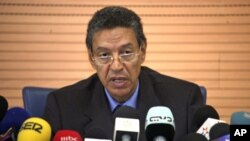 Moroccan Interior Minister Taieb Cherkaoui speaks during a news conference in Rabat, following last month's deadly cafe bombing in Marrakesh, May 6, 2011