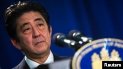 FILE - Japanese Prime Minister Shinzo Abe speaks at a news conference in New York. 