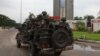 Congolese soldiers in their truck toward the state television headquarters in the capital Kinshasa, Democratic Republic of Congo, Dec. 30, 2013.