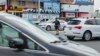 Local police officers guide traffic at busy intersections across Puerto Rico as the second blackout in a week leaves the entire island without power once again, Guayanbo, Puerto Rico, April 18, 2018. 