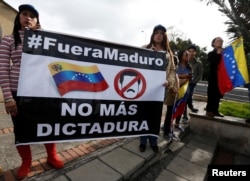 Venezuelans living in Colombia demonstrate against the constitutional assembly promoted by President Nicolas Maduro's government in Bogota, Colombia, July 29, 2017.