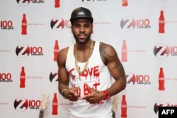 FILE - Singer Jason Derulo attends Z100 & Coca-Cola All Access Lounge at Z100's Jingle Ball 2013.