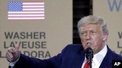 President Donald Trump speaks during an event at the Whirlpool Corporation Manufacturing Plant, Thursday, Aug. 6, 2020, in Clyde, Ohio. (AP Photo/Tony Dejak)