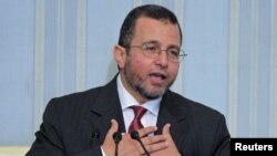 Egypt's new prime minister, Hisham Qandil, speaks during his first news conference in Cairo, August 2, 2012. 