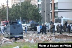 FILE - A car bomb explosion killed 7 policemen in Diyarbakir, March 31, 2016. Months of fighting between the Kurdish rebels and Turkish security forces has devastated the city.