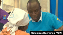 Members of Zimbabwe Lawyers for Human Rights Dec. 14, 2018, taking instructions from citizens in one of Harare’s poorest townships to take to court.