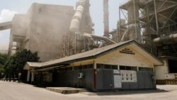 Fumes and dust are seen at Indonesian cement manufacturer PT Solusi Bangun Indonesia Tbk (SBI) in Bogor, West Java province, Indonesia, Sept. 21, 2021.