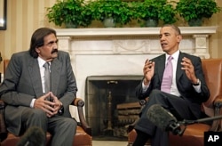 President Barack Obama meets with Emir Sheikh Hamad bin Khalifa Al-Thani of Qatar in the Oval Office of the White House in Washington, April 23, 2013.