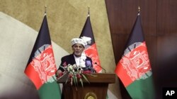 Afghan President Ashraf Ghani speaks at the extraordinary meeting of the Parliament in Kabul, Aug. 2, 2021. 