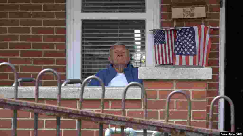 Retired steelworker Richard Check rests outside his home in Bethlehem, Pennsylvania, April 22, 2016.