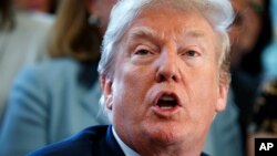 President Donald Trump speaks in the Oval Office on April 11, 2018. The same day, the president tweeted that Russia should be prepared for a missile strike in Syria in answer to a suspected chemical weapons attack.