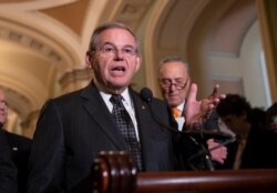 Sen. Bob Menendez, D-N.J., talks to reporters on Capitol Hill in Washington on June 12, 2018.