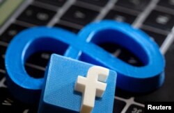 Logo Facebook dan Meta. (REUTERS/Dado Ruvic/Illustration//File Photo)