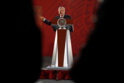 Mexican president Andres Manuel Lopez Obrador speaks during a news conference at National Palace in Mexico City, Mexico, June 14, 2019.