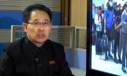 In this image made from video, North Korea's Ministry of Health Director Kim Dong Gun talks about the country's efforts to contain the spread of the new coronavirus, at the Ministry of Health in Pyongyang, North Korea, Jan. 30, 2020.