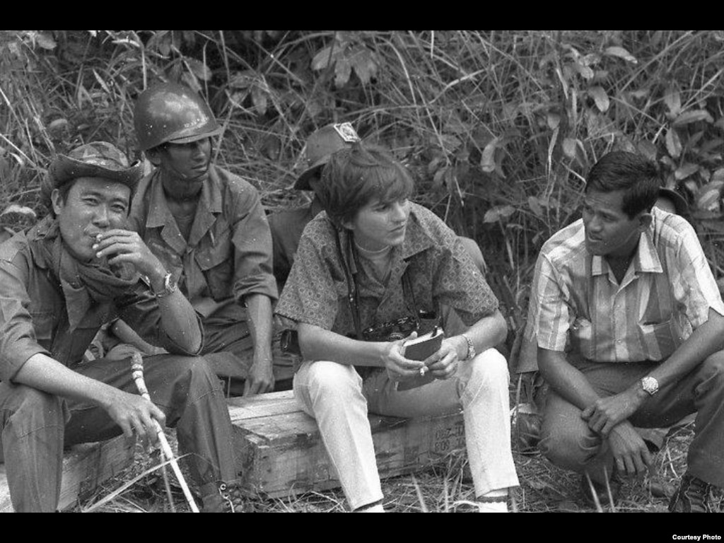 Kate Webb with soldier and her driver when she was on the field. (Sylvana Foa/Documentation Center of Cambodia)