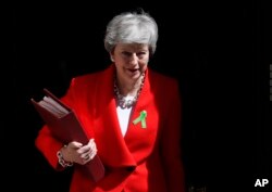 Britain's Prime Minister Theresa May leaves 10 Downing Street in London, May 15, 2019.