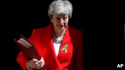 Britain's Prime Minister Theresa May leaves 10 Downing Street in London, May 15, 2019.