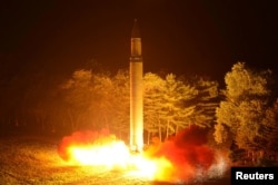A Hwasong-14 intercontinental ballistic missile is pictured during its second test-fire in this undated picture provided by KCNA in Pyongyang, North Korea, on July 29, 2017.