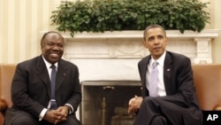 Gabon's President Ali Ben Bongo (left) with President Obama at White House (file photo)