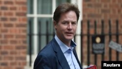 Britain's Deputy Prime Minister Nick Clegg arrives at Downing Street in London, Sept. 16, 2014. 