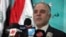 FILE - Haidar Al-Abadi speaks to the press.