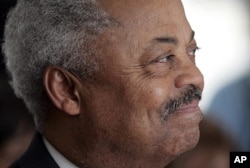 US Rep. Donald Payne, D-N.J., reacts while sitting in the audience during a ceremony to honor him by naming a plaza at the Essex County court complex the Congressman Donald M. Payne Plaza in Newark, New Jersey, April 20, 2009.