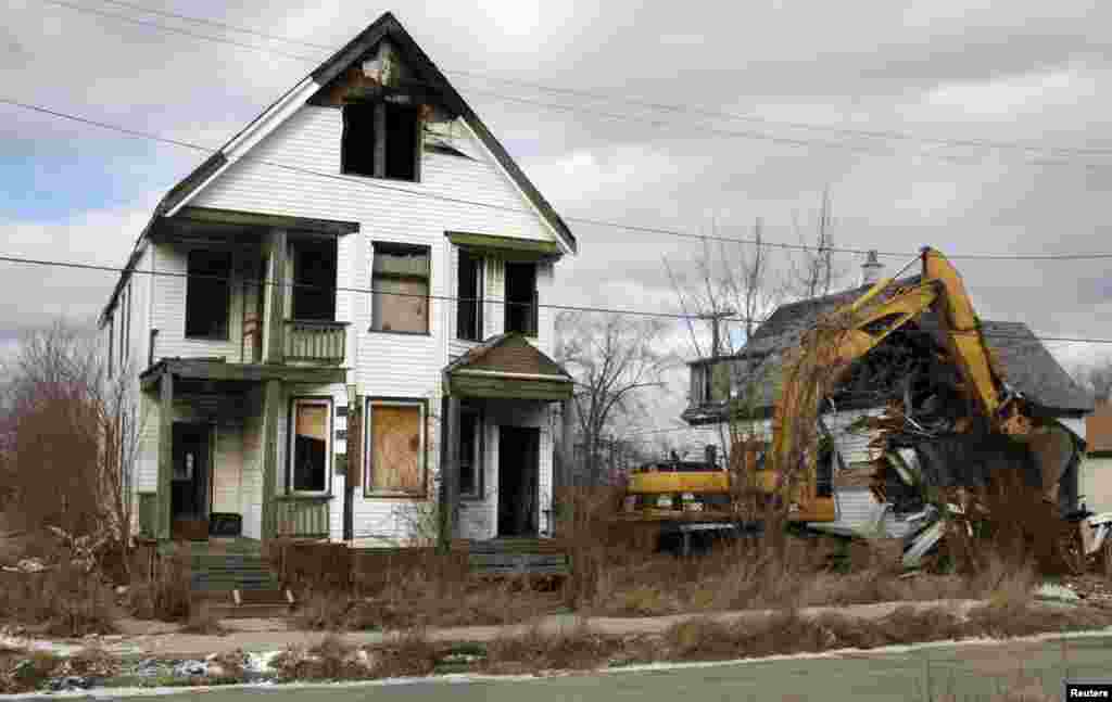 Vacant and blighted homes in an eastside neighborhood of Detroit, Michigan.