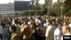 Foto yang dikirim seorang demonstran ke kantor berita AFP, menunjukkan aksi protes yang berlangsung di Dara'a, Jumat (18/3).