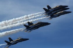 FILE - The US Navy Blue Angels will do a flight demonstration during the Fourth of July.