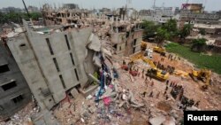 Rescue workers attempt to find survivors from the rubble of the collapsed Rana Plaza building in 2013.