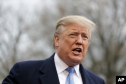 FILE - President Donald Trump speaks with reporters before boarding Marine One on the South Lawn of the White House, in Washington, April 5, 2019.