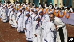 Bangladeshi Catholic nuns arrive to participate in a meeting with Pope Francis at the Church of the Holy Rosary in Dhaka, Bangladesh, Saturday, Dec. 2, 2017. (AP Photo/Aijaz Rahi)
