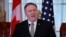 U.S. Secretary of State Mike Pompeo speaks during a news conference after the U.S.-Canada ministerial meeting at the State Department in Washington, Dec. 14, 2018. 