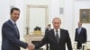 Assad Iyo Putin Oo Ku Kulmay Moscow