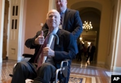 Sen. John McCain, R-Ariz., leaves a closed-door session on Capitol Hill in Washington, Dec. 2017. (File Photo)