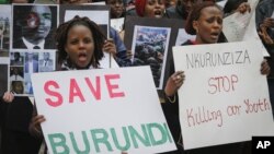 FILE - Burundi nationals from across the U.S. and Canada, along with supporters, demonstrate outside U.N. headquarters, calling for an end to political atrocities and human rights violations unfolding in Burundi under the government of President Pierre Nkurunziza on April 26, 2016, in New York. 