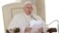 Pope Francis delivers his message during his weekly general audience in St. Peter's Square at the Vatican, Sept. 26, 2018. 