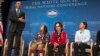 President Barack Obama speaks as, from left, Tatiana Ticknor of the Yup'ik/Tlingit/Dena'ina, Brayden White of the St. Regis Mohawk Tribe and Blossom Johnson of the Navajo Nation listen during the 2015 White House Tribal Nations Conference, Nov. 5, 2015.