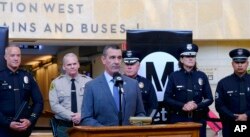 Transportation Security Administration (TSA) administrator David P. Pekoske, center, talks during a news conference in Los Angeles' Union Station, Aug. 14, 2018.