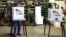 FILE - Voters cast their ballots at a polling station set up in a garage during the U.S. presidential election, near Fernald, Iowa, Nov. 8, 2016.